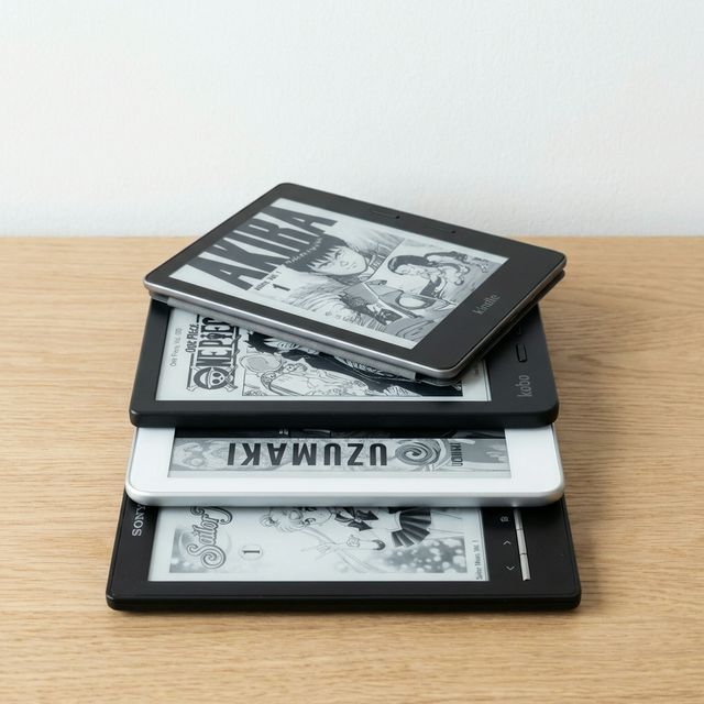 Stack of e-readers showing manga